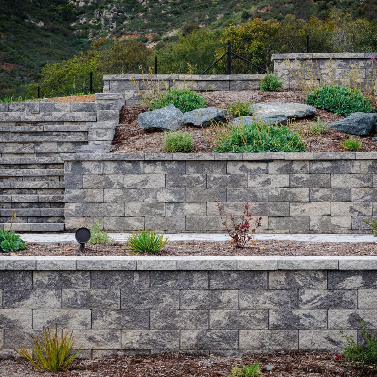 Multi-Tiered Engineered Retaining Wall with Stairs